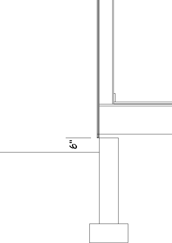 Section view displaying walls with footings with the terrain 6" below the top of the footing